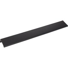 a black shelf that is on top of a white wall