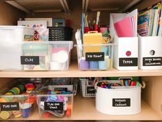 the shelves are filled with different types of crafting supplies and storage bins on them