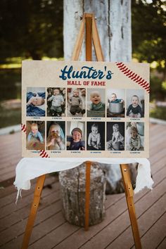 a wooden easel holding a sign with pictures of babies on it and the words hunter's hall of fame