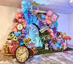 a clock surrounded by balloons and other decorations