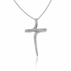 "The beauty of Greek jewelry, completely handcrafted in Greece with the old-fashioned way, is omnipresent. An outstanding 14k solid gold cross decorated with Cz remains a classic and elegant choice for everyone. Bold and traditional, you will not take your eyes off. Neither will your friends! High Quality Handmade Greek jewelry! The cross can be worn on both sides ✔ Chain Dimensions: 45 Cm ✔ Dimensions: Millimetres: 39 x 22mm ✔ Dimensions: inches : 1.53x 0.88 in ✔ High quality product. ✔ In a gi White Gold Cross Charms For Anniversary, Luxury Cross Necklace For Anniversary, Elegant Crucifix Diamond Necklace For Anniversary, Elegant Sterling Silver Cross Charms And Jewelry, Elegant Sterling Silver Cross Jewelry And Charms, Classic Diamond White Cross Necklace, Cubic Zirconia Cross Diamond Necklace For Anniversary, Polished Cross Necklace For Formal Occasions, Anniversary Diamond Cross Pendant Necklace With Pave Setting