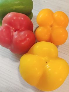 three different types of peppers on a table