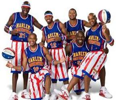 a group of basketball players posing for a photo with an american flag on their uniform