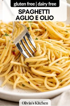 a fork is stuck into spaghetti on a plate with the words gluten free dairy free spaghetti aglio e ollo