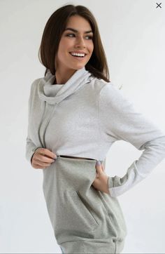 This is our #1 selling NURSING SWEATSHIRT and it comes in many color combos! The main reasons: the QUALITY fabric, LOOSE fit, and the TRENDY design! The material is super soft and washes great! **Nursing opening is hidden along the colorblock line. It's one long zipper with pulls on both sides, making it super easy to nurse (for any size chest).  **Two-tone thumbholes **95% cotton, 5% spandex **Machine wash **Fits true to size with a roomy fit. Size down if between sizes. MODEL: Alex is a size 2, 5'6 and is wearing a size XS. Jen is a size 18, 5'3, and is wearing a size XL. Check out our size chart, https://www.nursingqueen.com/pages/size-chart RETURN POLICY: 30 days and FREE exchanges. Normally SHIPS SAME DAY (shipping takes 2-4 days in the USA)! Nursing Sweatshirt, Nursing Sweater, Nursing Hoodie, Nursing Wear, Cowl Neck Sweatshirt, Nursing Tops, Nursing Clothes, Nursing Shirts, Pullover Sweatshirts