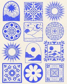 some blue and white designs on a white paper with the sun in the sky above them