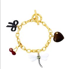 This Is An Authentic Coach Charm Bracelet That Is New With Tags And Comes With Dust Bag. Brass/Glass/Semi-Precious Tiger's Eye/Enamel/Resin Toggle Closure Approx. 7.25" L X .25" W X .8" Drop Coach Metal Bracelet Jewelry, Elegant Multicolor Metal Charm Bracelet, Coach Jewelry Bracelet Gift, Coach Bracelet Jewelry Gift, Coach Adjustable Bracelet As Gift, Adjustable Coach Bracelets As Gift, Adjustable Coach Bracelets For Gift, Black Bangle, Coach Jewelry