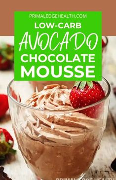 chocolate mousse in a glass bowl with strawberries on the side and text low carb avocado chocolate mousse