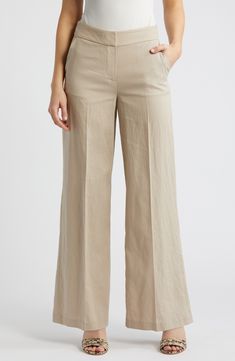 Clean lines and simple details offer a refined appearance in wide-leg linen-blend pants expertly tailored to elevate both in-office and off-duty looks. 31" inseam; 24 1/2" leg opening; 10 3/4" front rise; 15 3/4" back rise Zip fly with hook-and-bar closure Side-seam pockets 55% rayon, 45% linen Dry clean Imported Tailored Linen Wide Leg Pants For Business Casual, Modern Linen Wide Leg Pants For Workwear, Classic Full-length Linen Wide Leg Pants, Neutral Linen Bottoms For Business Casual, Spring Office Wide Leg Pants In Relaxed Fit, Classic Full Length Wide Leg Linen Pants, Classic Full Length Linen Wide Leg Pants, Business Casual Neutral Linen Bottoms, Business Casual Linen Wide Leg Pants