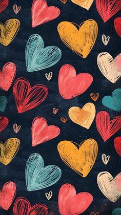 colorful hearts drawn in chalk on a black background