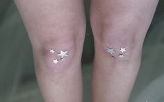 two white stars on the legs of a person