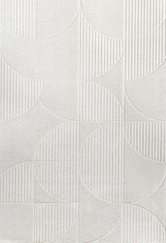 a white rug with circles and lines on it