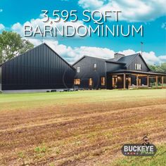 a large black barn with the words 350 soft bardomminum in front of it