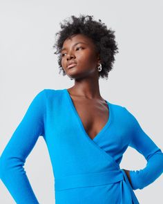 Crafted from a soft cashmere wool blend, the Astrid midi dress has a cozy feel. This true wrap dress has long sleeves, a V-neckline, and ties at the waist. A bestseller year after year, this piece has a simple, polished look that can be dressed up or down.Li-lin-zi is 5 Foot and 8 Inches and wearing a size XS. Fitted Cashmere V-neck Cardigan, Fitted V-neck Cashmere Cardigan, Fitted Long Sleeve Cashmere Dress, V-neck Midi Dress For Winter Loungewear, Fitted V-neck Wrap Dress For Fall, Blue Fitted Wrap Dress For Fall, Fitted Wrap Dress For Fall, Fitted V-neck Midi Dress For Loungewear, Wrap Dress Dvf