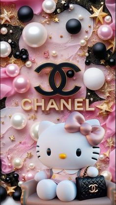 a hello kitty doll sitting on top of a chair in front of a chanel sign