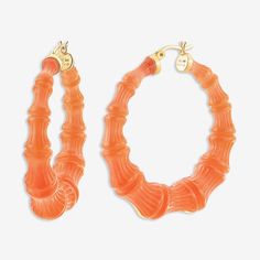 WHEN YOU NEED A VACATION WHAT IT IS: A chic pop of colorWHY IT’S SPECIAL: If you're looking for the perfect orange, you've found it! Colorful but easy to wear, these hoops add just the right pop of color. The details in the bamboo design elevate these to a notch above your average hoops GOOD TO KNOW: Handcrafted Lucite 14K Gold plated, sterling silver posts Size: 2" Due to their handmade nature, each piece is unique WHY WE LOVE GOLD AND HONEY: These four sisters bridge the gap between fashion an Trendy Small Hoop Orange Jewelry, Trendy Small Hoop Orange Earrings, Orange Small Hoop Earrings For Summer, Summer Orange Small Hoop Earrings, Trendy Orange Round Earrings, Casual Orange Earrings, Orange Small Hoop Summer Jewelry, Summer Orange Hoop Jewelry, Orange Small Hoop Jewelry For Summer