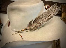 unique Red, Black, Yellow native style markings and beaded sinew wind tie for added security to your hat, Black, yellow and red native style. one of a kind unique markings, a beautiful wild turkey feather for your custom hat accessory HAT NOT INCLUDED Ships Free in USA Cowboy Hat Feather, Wild Turkey, Turkey Feathers, Native Style, Cowboy Hat, Custom Hats, Cowboy Hats, Nativity, Caps Hats