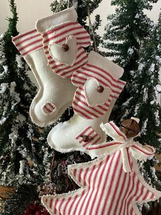 christmas stockings and stocking hanging from a tree