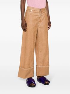 Find MARNI High-waist Wide-leg Trousers on Editorialist. camel brown cotton garment dyed flocked finish logo patch to the rear high waist belt loops concealed fly and button fastening classic five pockets wide cropped leg turn-up hem