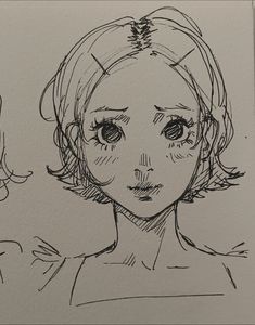 a black and white drawing of a woman's face with two different angles to it