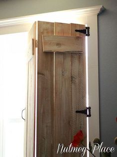 an open wooden door in a room