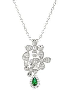 The Floral White Gold Pendant Necklace features an 18 karat white gold delicate chain with a floral mosaic pendant at the forefront. Emulating falling flowers, the pendant is composed of white gold four-leaf clovers adorned with diamonds, complete with a teardrop-shaped natural emerald and pavé diamonds. Flower Diamond Pendant, Falling Flowers, White Gold Pendant Necklace, Floral Mosaic, White Gold Pendant, Delicate Chain, Floral Necklace, Color Stone, Floral White