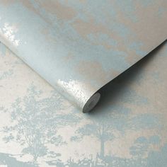 a blue and white wallpaper with trees on it