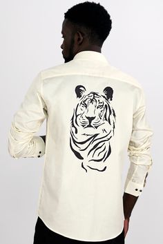 Unleash your artistic flair with the Albescent Cream and Black Tiger Hand Painted Super Soft Premium Cotton Designer Shirt, featuring a captivating hand-painted design at the back. The unique black tiger motif on the albescent cream fabric adds a touch of individuality and creativity to your ensemble. Crafted from luxurious super soft cotton, this shirt ensures both comfort and style, making it a perfect choice for work or special occasions. Whether you're aiming to make a fashion statement or e Tiger Fabric, Gents Shirts, Types Of Textiles, Paint Shirts, Black Tiger, Girls Frock Design, Black Tigers