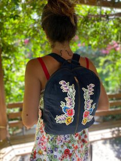 A lovely backpack for everyday use. Our collection includes a variety of designs to suit your style. Made out of denim. Not only eco-friendly but also fashionable, featuring trendy designs that will make you stand out. Approximate dimensions of the backpack: Width: 32 cm Height: 38 cm Handle: 75 cm This is 100% handmade that has variations of colours, texture. Small imperfections/differences in shape, size and colour can happen and are part of the charm of a handmade product. Please do not hesitate to contact me with your questions. Flowers, Cross Stitch, Denim Backpack, Large soft denim Backpack bag, Casual Backpack, Daily Backpack, Travel Backpack, School Backpack, Laptop Bag, Notebook Bag Summer Cotton Backpack For Daily Use, Trendy Embroidered Backpack For Everyday Use, Casual Embroidered Travel Bag, Casual Summer Backpack For Daily Use, Summer Travel Backpack In Cotton, Trendy Embroidered Backpack For Travel, Casual Embroidered Backpack For Daily Use, Blue Backpack For Daily Use In Spring, Casual Softback Backpack For Spring