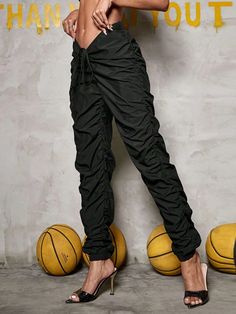 Explore the great outdoors or go for a casual event in style with these Drawstring Cargo Jogger Pants! Crafted from lightweight fabric and featuring a classic drawstring waist in a bold and elegant black color, they offer the utmost comfort and a perfect fit. So whether you’re strolling in the park or tackling a trail, do it in style. Details: Color: Black Style: Casual Pattern Type: Plain Type: Jogger Closure Type: Drawstring Waist Waist Line: High Waist Length: Long Fit Type: Regular Fit Fabri Black Stretch Pants With Functional Drawstring, Black Drawstring Cargo Pants For Spring, Spring Black Cargo Pants With Drawstring, Sporty Drawstring Ankle-length Joggers, Sporty Ankle-length Joggers With Drawstring, Sporty Summer Cargo Pants With Drawstring, Spring Leisure Joggers With Drawstring, Black Drawstring Pants For Summer, Stretch Black Parachute Pants For Outdoor