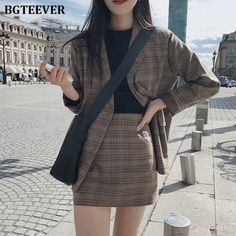 Brand Name: BGTEEVERDecoration: PocketsMaterial: SpandexMaterial: PolyesterMaterial: COTTONStyle: vintageCollar: NotchedClosure Type: Single BreastedItem Type: Skirt SuitsSleeve Length(cm): Fullis_customized: NoGender: WOMENMaterial Composition: Cotton, Polyester, SpandexModel Number: LY3650Clothing Length: RegularDresses Length: Above Knee, Minigender: womenitem type: plaid skirt suits Checkered Suit, Retro Suits, Dark Academia Clothing, Female Office, Brown Mini Skirt, Ladies Blazer, Mini Pencil Skirt, High Waisted Pencil Skirt, Blazer Set