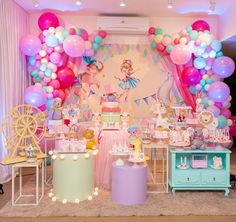 a birthday party with balloons and decorations