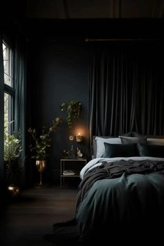 a bedroom with black walls and dark curtains