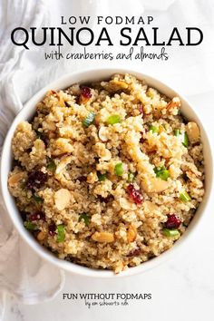 quinoa salad with cranberries and almonds in a bowl on a white background