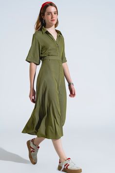 Length: Maxi length. Subcategory: Dress. Neck: Polo collar. Sleeves: Short Sleeves. Fit: Relaxed fit. Style: Boho. Detail: Belt of same fabric included. Fabric: Lightweight woven fabric . Zipper: Button placket. runs true to size. S. 70% Viscose 27% Polyester 3% Elastane Solid Summer Dress With Placket, Summer Dress With Solid Color And Placket, Summer Dress With Placket, Khaki Short Sleeve Dress With Relaxed Fit, Khaki Short Sleeve Relaxed Fit Dress, Khaki Relaxed Fit Short Sleeve Dress, Solid Color Summer Midi Dress For Office, Solid Color Midi Dress For Summer Office, Solid Midi Dress For Summer Office Wear