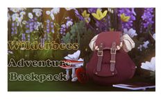 a backpack sitting on the ground with flowers in the background and text that reads wildbees adventure backpack