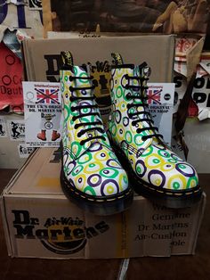 VINTAGE Dr Martens Patterned Leather Boots These are a very unique pair of original, Made in England Dr Martens.  These were made at their original factory in Northampton in the 1990s. Product made by the brand in this Era is possibly their best. These 8 hole boots have a white leather background with multi coloured Circles on top. These are very rare, maybe a one off pair waiting too be loved. These are a UK size 4, EUR 37, ladies US 6 Retro Multicolor Boots With Round Toe, Retro Multicolor Round Toe Boots, Vintage Green Boots With Round Toe, Retro Round Toe Boots For Streetwear, Color Circle, Vintage Boots, Hunter Boots, Dr. Martens Boots, Dr. Martens