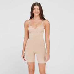 This innovative bodysuit combines a strapless bra with a comfortable mid-thigh shaper for the perfect all-in-one solution for your wardrobe. Designed with all-over shaping magic and lightweight fabric, this style gives you a totally sleek look for any occasion. Featuring removable and adjustable straps, this versatile bodysuit can be worn five ways, so you can pair it with almost any dress (especially strapless)! Color: Beige. Gender: female. Age Group: adult. Pattern: Solid. Material: Nylon.