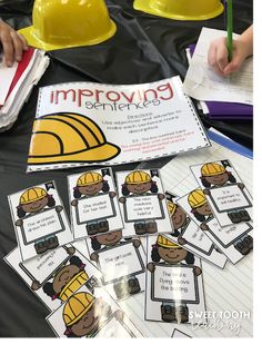 a table with construction themed activities for students to practice their writing skills and read alouds