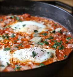 an iron skillet with some food in it