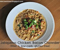 a white plate topped with food on top of a wooden table