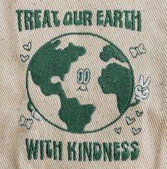 there is a patch on the back of a shirt that says treat our earth with kindness