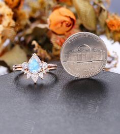 Years of love story：https://www.etsy.com/shop/GemsOdes You may like these rings: https://www.etsy.com/listing/860283335 https://www.etsy.com/listing/841149840 https://www.etsy.com/listing/1003829432 All our jewelry is 100% authentic, Please check the availability of selected gems and other detail before purchase. Metal Type: Solid 14K Rose Gold (shown in the picture) Size: All sizes are available, contact me if they do not contain the size you want in the drop-down menu. ▷Product Summary Engagem Moonstone Halo Crystal Ring For Wedding, Pear-shaped Moonstone Ring For Wedding, Pear-shaped Moonstone Wedding Ring, Teardrop Moonstone Wedding Ring In Fine Jewelry Style, Teardrop Opal Diamond Wedding Ring, Teardrop Moonstone Wedding Ring Fine Jewelry, Fine Jewelry Teardrop Moonstone Wedding Ring, Wedding Fine Jewelry Teardrop Moonstone Ring, Teardrop Moonstone Wedding Ring