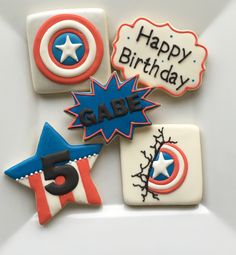 decorated cookies with the words happy birthday and captain america written on them are arranged in different shapes