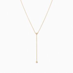 Little Things Dainty Chain Lariat Necklace in Gold | Uncommon James Chic Yellow Gold Lariat Necklace With Delicate Chain, Minimalist Lariat Necklace With Clavicle Chain For Layering, Adjustable Dainty Lariat Necklace For Layering, Minimalist Dangle Necklaces For Layering, Minimalist Adjustable Lariat Layered Necklace, Minimalist Layering Dangle Necklaces, Everyday 14k Gold Filled Lariat Necklace With Adjustable Chain, Minimalist Drop Necklace For Layering, Chic Delicate Chain Lariat Necklace For Everyday