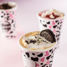 three cups filled with ice cream and oreo cookies