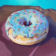 a painting of a donut with sprinkles sitting on top of a table