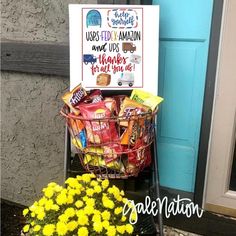 a basket full of food sitting next to a sign that reads, i love the american way