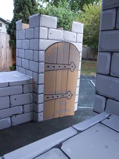 a cardboard castle made to look like it is outside