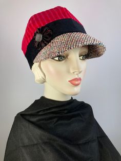 "Ava" is a pretty red and black corduroy baseball style newsboy cap that's a standout! The red top is a pretty textured corduroy. The band is black corduroy and the brim is a colorful woven silk tweed fabric. It is all topped off with a silk rosette and vintage silver metallic button. The hat is fully lined with a pretty cotton fabric and an inner grosgrain ribbon helps the hat keep its shape and keep it free from makeup. This baseball/newsboy shape is deeper than a traditional baseball hat and sits lower on the head - looks best with your ears tucked under. Wear the brim down in the traditional manner or flip it back for an additional look. A great hat for travel as well. In stock and ready to ship. One of a kind and handmade in the USA. ++++++++++++++++++++++++++FIT AND SIZE: Comfortably London In March, Soft Hats, Travel Hat, Hat Baseball, Newsboy Cap, Casual Hat, Tweed Fabric, Beautiful Hats, Winter Hat